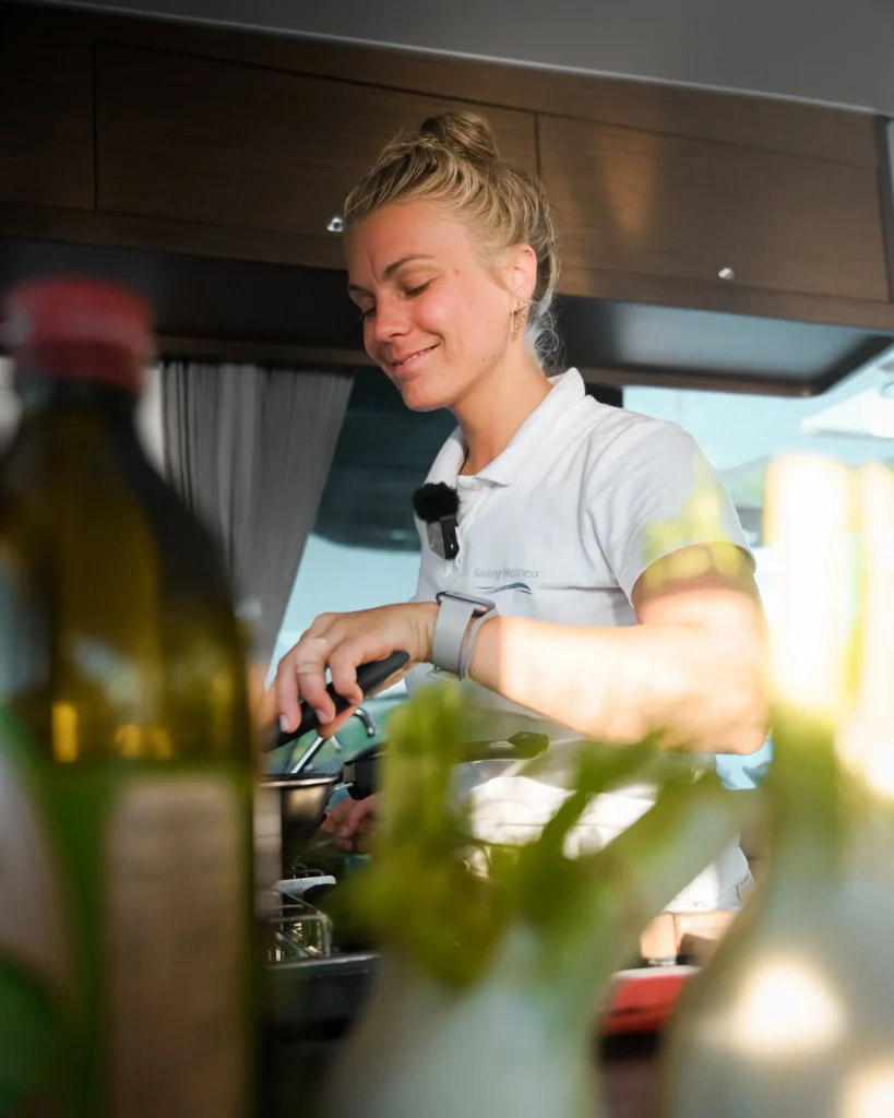 fig 3 vallery+cooking+in+the+galley+during+sailing2wellness+trip,+sardinia